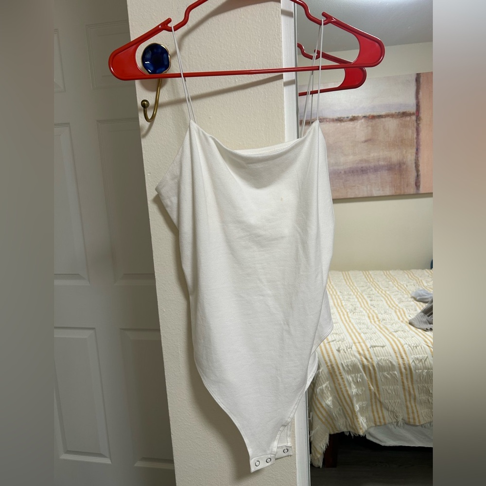 White body suit with thin straps